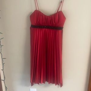 Red silky formal dress with black beaded band